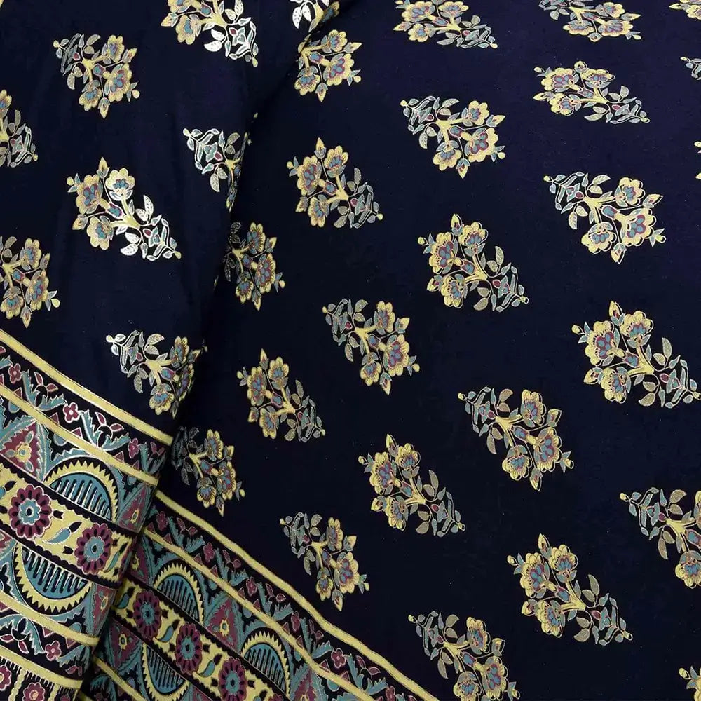 Bedsheet design - Navy blue fabric with floral patterns and a colorful border