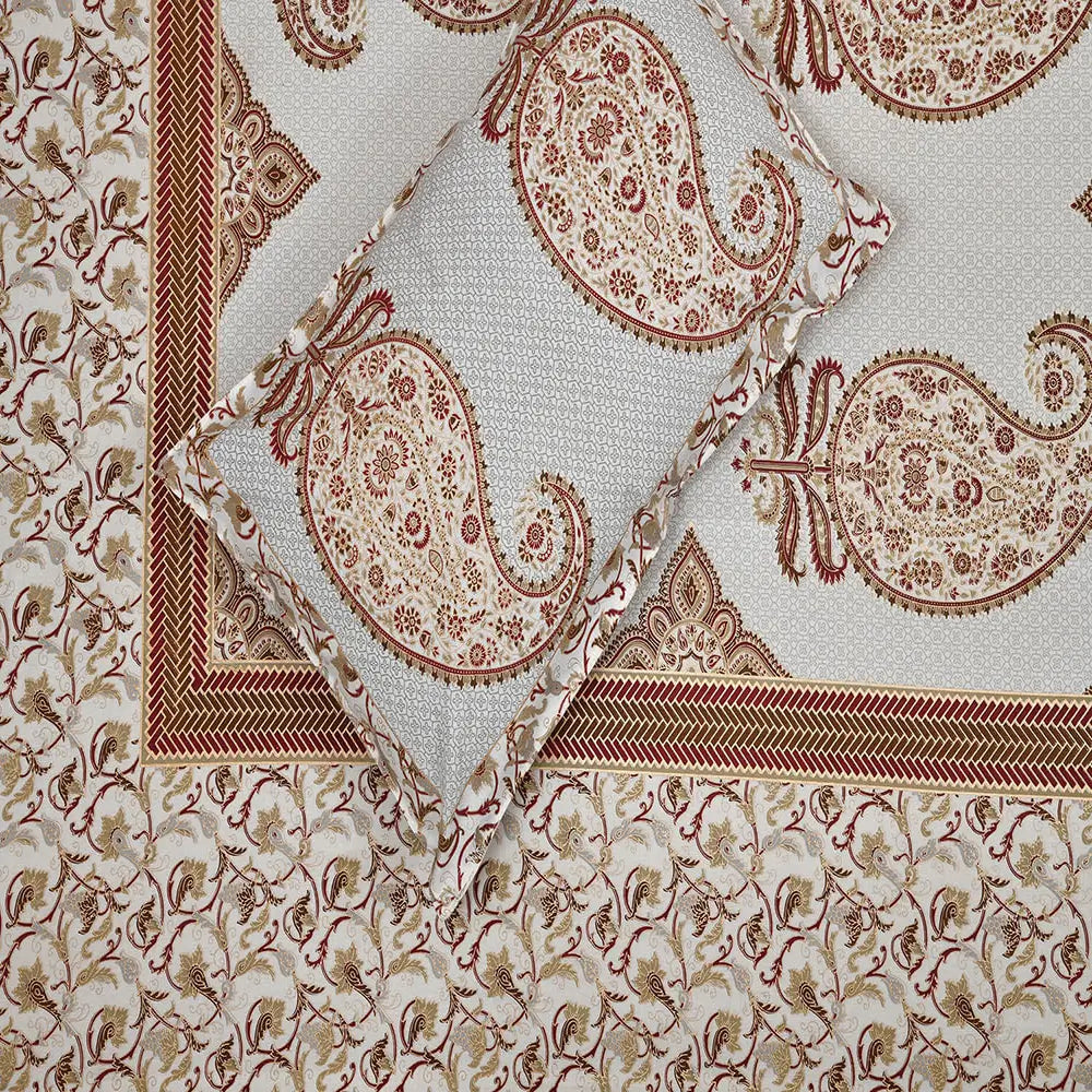 Close-up of patterned fabric with red and beige design of Floral Paisley White Jaipuri Gold Print Cotton Bedsheet