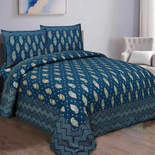 Blue patterned bedding set on a bed in a bedroom setting