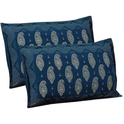 Two blue pillowcases with white paisley pattern on a white background