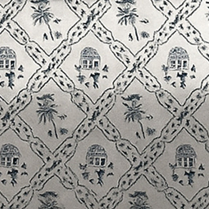 Patterned fabric with geometric design and small house and palm tree motifs on a light background