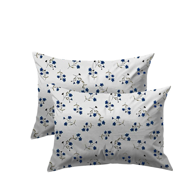Two white pillows with blue floral pattern on a white background