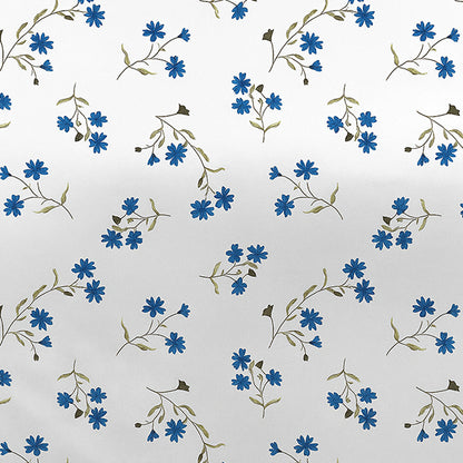 Bedsheet design - Pattern of blue flowers and green leaves on a white background