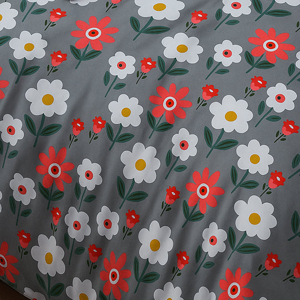 Floral pattern with red, white, and green flowers on a gray background