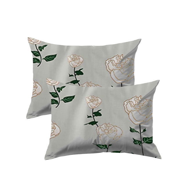 Two pillows with floral patterns on a white background