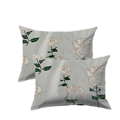 Two pillows with floral patterns on a white background