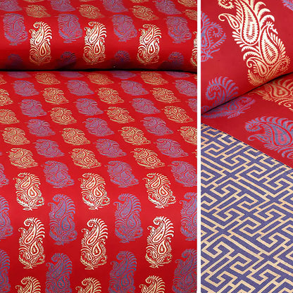Red fabric bedsheet design with gold and blue patterns, including paisley and geometric designs.