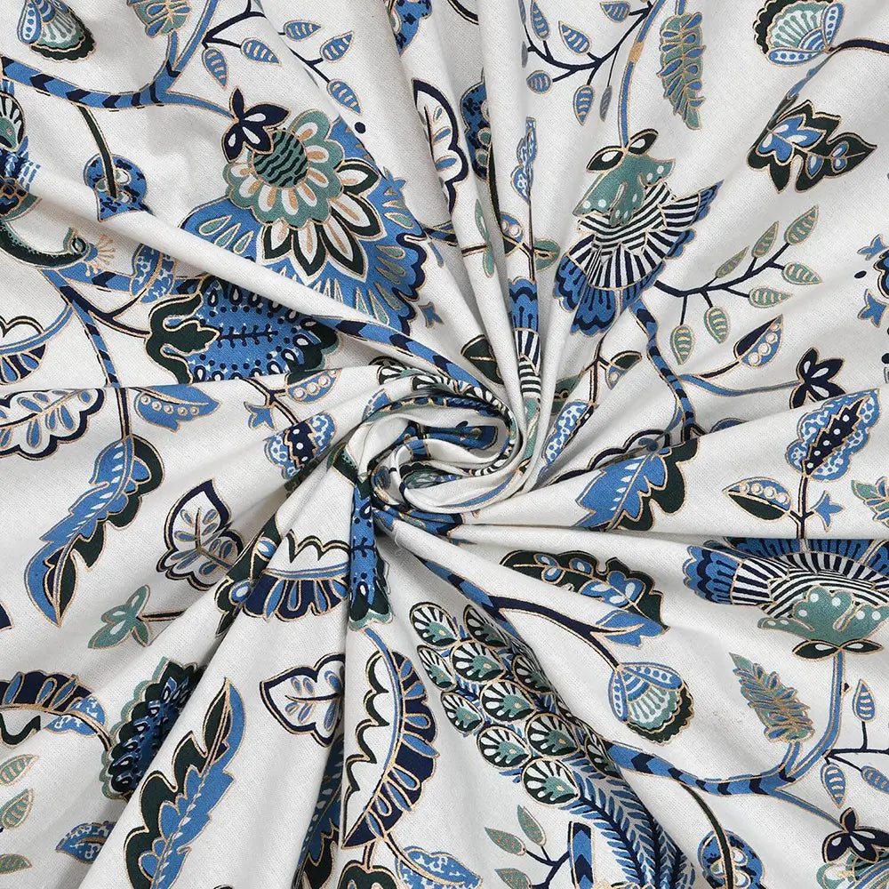 Jaipri gold bedsheet with Floral patterned fabric with blue and green designs on a white background
