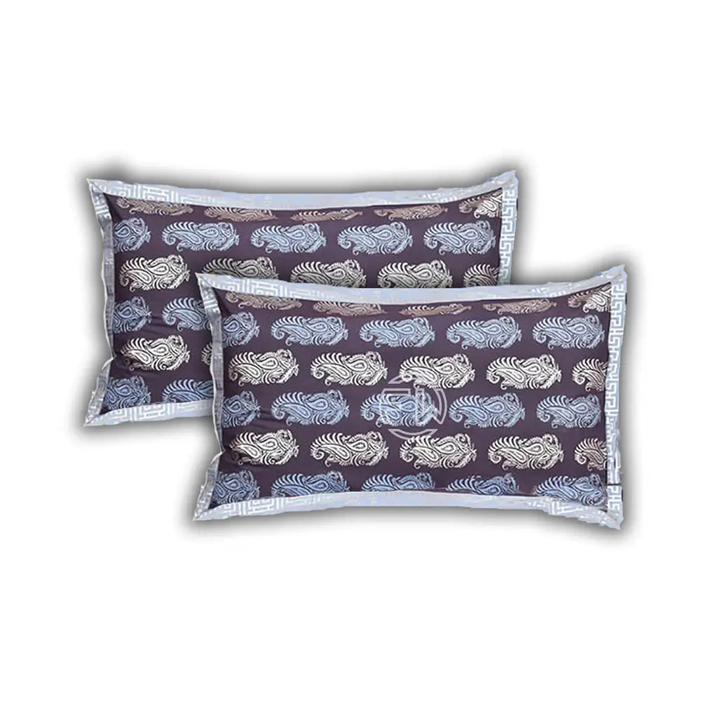 Two patterned pillows on a white background