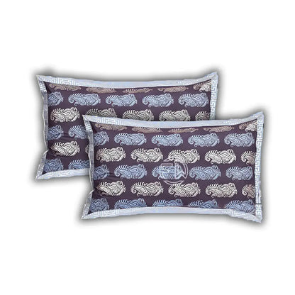 Two patterned pillows on a white background