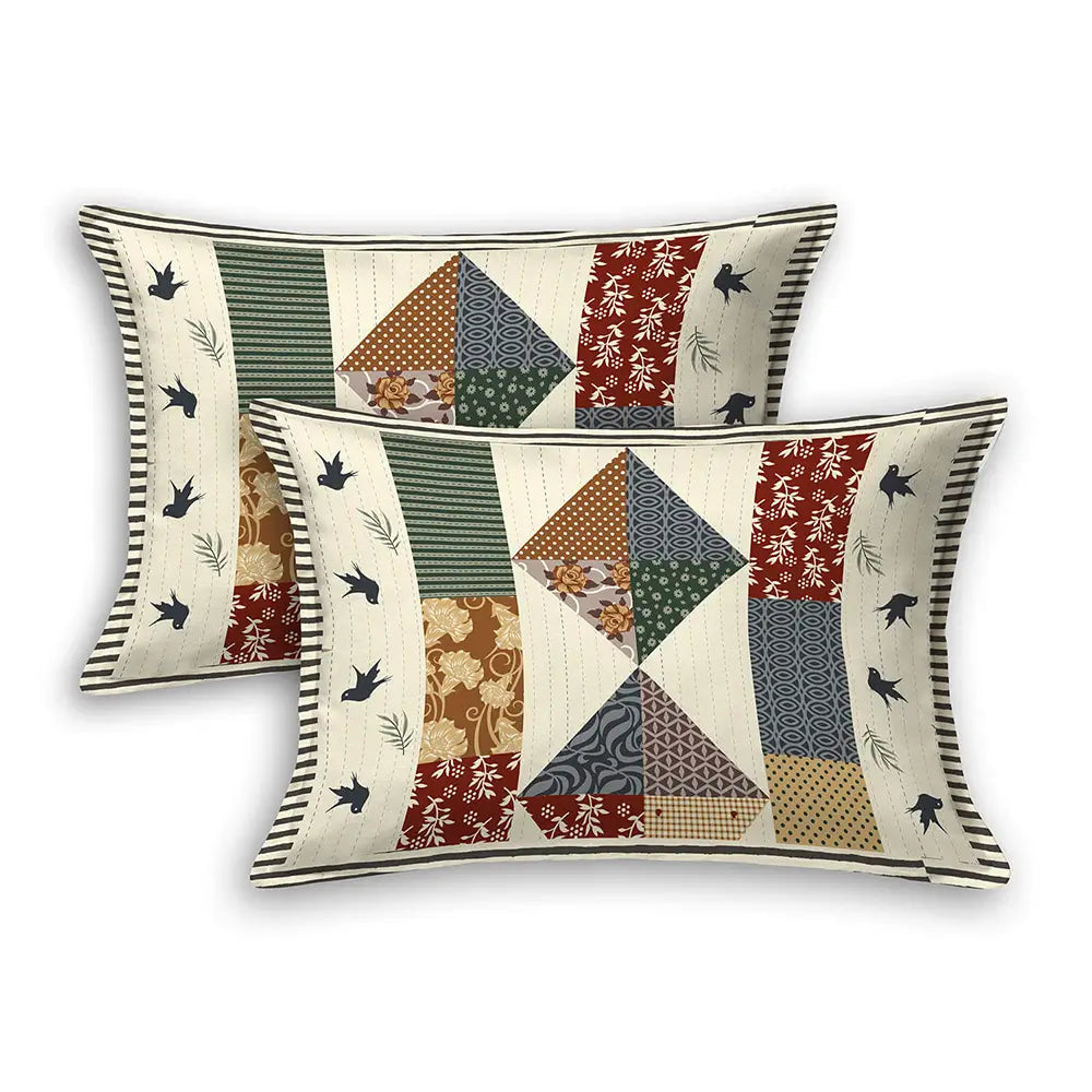 Two decorative pillows with Shop Black Bird Cream Base Bedsheet