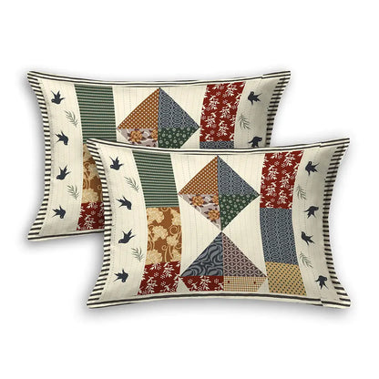 Two decorative pillows with Shop Black Bird Cream Base Bedsheet