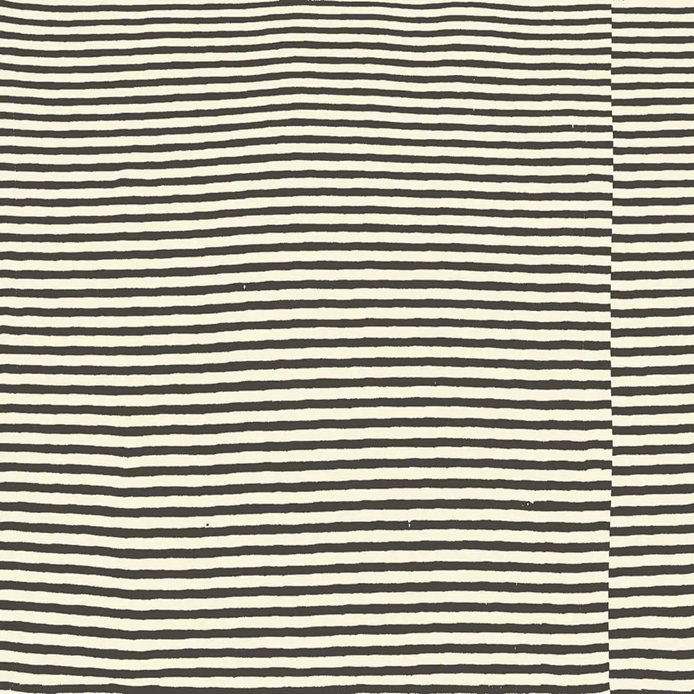 Striped fabric pattern with alternating black and white horizontal lines.
