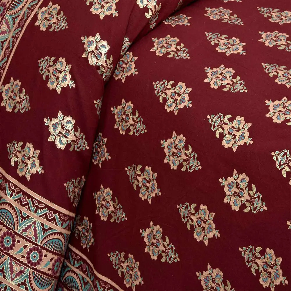 Bedsheet design - Close-up of maroon fabric with floral pattern