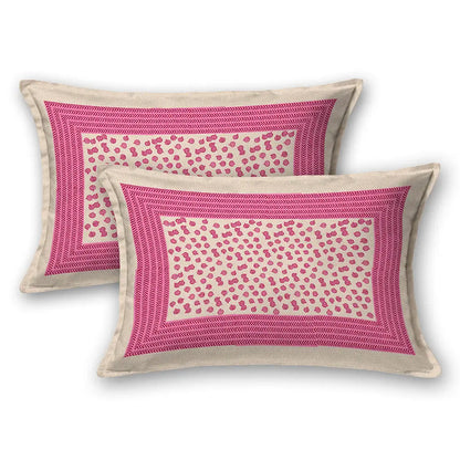 Two pink and beige patterned pillows on a white background with doria print pink flower bedsheet