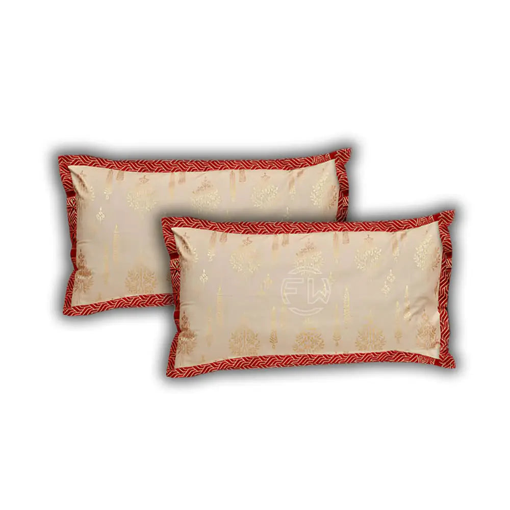 Two decorative pillows with red borders on a white background
