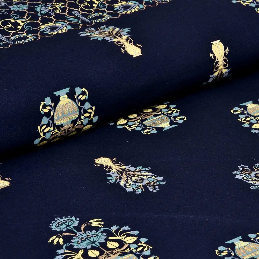 Navy blue fabric with gold and light blue floral and leaf patterns bedsheet