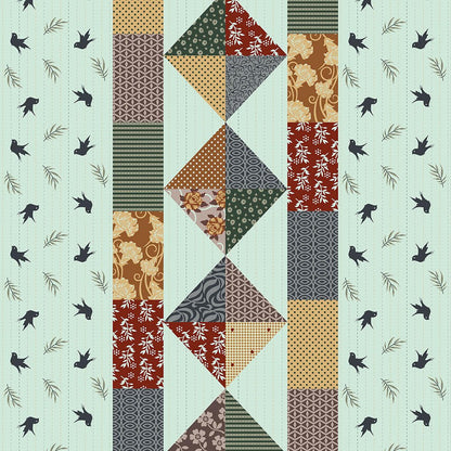 Patchwork quilt with geometric patterns and bird illustrations on a light blue background