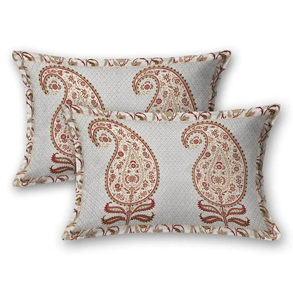 Two decorative pillows with paisley pattern on a white background
