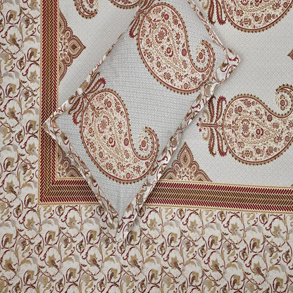 Close-up of patterned fabric with red and beige design of Floral Paisley White Jaipuri Gold Print Cotton Bedsheet